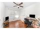 Office featuring hardwood floors, bright windows, and a built-in desk at 1107 Fairfield Dr, Gastonia, NC 28054