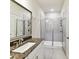 Clean bathroom with a modern sink, framed mirror, and a walk-in shower at 1132 Whitby Moore St, Charlotte, NC 28273