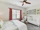 Charming Bedroom with crib, rocker, and soothing decor at 1132 Whitby Moore St, Charlotte, NC 28273