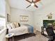 Cozy bedroom with a ceiling fan, plush carpet, and a comfortable bed at 1132 Whitby Moore St, Charlotte, NC 28273