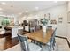 Bright dining area with modern decor and open-concept layout to the kitchen at 1132 Whitby Moore St, Charlotte, NC 28273