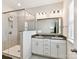 Beautiful main bathroom with a double sink vanity and glass-enclosed shower at 1132 Whitby Moore St, Charlotte, NC 28273