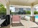 Community pool with a relaxing sun deck and outdoor seating; perfect for hot summer days at 1132 Whitby Moore St, Charlotte, NC 28273