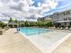 Well-maintained community pool with ample lounge chairs and a shaded area at 1132 Whitby Moore St, Charlotte, NC 28273