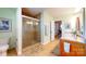 Clean bathroom with a tiled shower, double sinks, and bright lighting at 114 Caraway Ln, Mooresville, NC 28117