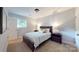 Comfortable bedroom with neutral tones, a window, and a cozy atmosphere at 114 Caraway Ln, Mooresville, NC 28117