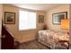 Small bedroom with carpeted floors, neutral walls, and one window providing natural light at 114 Caraway Ln, Mooresville, NC 28117