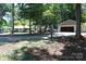 Charming home exterior featuring a detached garage at 114 Caraway Ln, Mooresville, NC 28117