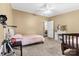A well-lit bedroom features neutral walls, two beds, and a white vanity table at 125 Brasington Ln, Mooresville, NC 28115