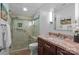 Elegant bathroom featuring a walk-in shower, granite countertops, and modern fixtures at 12524 Angel Oak Dr, Huntersville, NC 28078