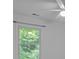 Bright bedroom showcasing a window view at 12524 Angel Oak Dr, Huntersville, NC 28078