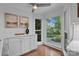 This breakfast nook features a large window, views of the backyard, and counter seating at 12524 Angel Oak Dr, Huntersville, NC 28078