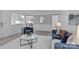 Stylish living room with an open layout, modern furnishings, and easy access to the kitchen at 12524 Angel Oak Dr, Huntersville, NC 28078