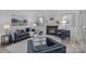 Comfortable living room with a fireplace, plush seating, and modern decor at 12524 Angel Oak Dr, Huntersville, NC 28078