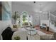 Spacious living area featuring hardwood floors, a cozy sofa, and lots of light at 12524 Angel Oak Dr, Huntersville, NC 28078