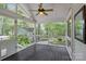 Inviting screened porch with an exterior view of the well-maintained backyard at 12524 Angel Oak Dr, Huntersville, NC 28078