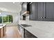 Modern kitchen featuring stainless steel stove, sleek countertops, and ample cabinet space at 130 Broken Arrow Dr, Statesville, NC 28677