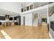 Bright, open-concept space with modern kitchen and living area under a soaring vaulted ceiling at 130 Broken Arrow Dr, Statesville, NC 28677