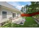 Cozy backyard patio area with seating, perfect for outdoor enjoyment at 13247 Eastfield Village Ln, Charlotte, NC 28269