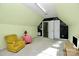 Bonus room features chalkboard paint, comfortable seating, and ample lighting at 13247 Eastfield Village Ln, Charlotte, NC 28269