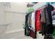 Large walk-in closet with ample storage space and organization racks at 13247 Eastfield Village Ln, Charlotte, NC 28269