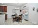 Cozy breakfast nook with access to the patio, featuring bright natural light at 13247 Eastfield Village Ln, Charlotte, NC 28269
