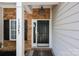 Close-up of the front door with stone accents and a welcoming entrance at 13247 Eastfield Village Ln, Charlotte, NC 28269