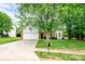Attractive single-Gathering home with a well-maintained lawn, brick facade and an attached garage at 13402 Mccoy Rd, Huntersville, NC 28078