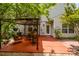 Inviting back patio with a gazebo and cozy outdoor seating at 13622 Stringfellow Ln, Charlotte, NC 28278