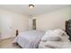 Comfortable bedroom has neutral walls and plush carpet at 13622 Stringfellow Ln, Charlotte, NC 28278