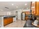 Spacious kitchen with stainless steel appliances, ample cabinet space, and modern countertops at 13622 Stringfellow Ln, Charlotte, NC 28278
