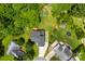 Aerial view of home in lush, wooded neighborhood at 13832 Queenswater Ln, Charlotte, NC 28273