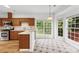 Bright kitchen with lots of natural light, stainless steel appliances and hardwood floors at 13832 Queenswater Ln, Charlotte, NC 28273