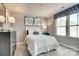 Comfortable bedroom with gray walls, stylish decor, and a window with a decorative valance for added charm at 147 Commerce Blvd # 0003, Lancaster, SC 29720