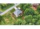 Drone image showing the property's backyard and surrounding landscape at 1616 Indian Springs Nw Dr, Conover, NC 28613