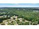 Aerial view of a property surrounded by lush greenery in a peaceful neighborhood at 1616 Indian Springs Nw Dr, Conover, NC 28613