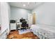Bedroom with a bed, desk and natural light from a sunny window at 1616 Indian Springs Nw Dr, Conover, NC 28613