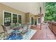 Covered deck with a dining table and chairs, offering outdoor living space at 1616 Indian Springs Nw Dr, Conover, NC 28613