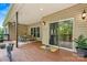 Back deck featuring wood floors with outdoor dining and sliding glass doors at 1616 Indian Springs Nw Dr, Conover, NC 28613