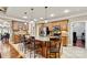 Spacious kitchen featuring a center island with seating, stainless steel appliances, and custom cabinetry at 1616 Indian Springs Nw Dr, Conover, NC 28613