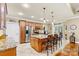 Well-appointed kitchen featuring a large island with seating, stainless steel appliances, and ample cabinet space at 1616 Indian Springs Nw Dr, Conover, NC 28613