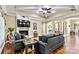 Inviting living room features a fireplace, media center, hardwood floors, and access to the foyer at 1616 Indian Springs Nw Dr, Conover, NC 28613