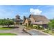 Elegant clubhouse with stone accents, a tower feature, and professional landscaping for an upscale community appeal at 17637 Snug Harbor Rd, Charlotte, NC 28278