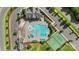 Aerial perspective of a community pool with lap lanes, kiddie area, tennis and basketball courts, plus ample parking at 17637 Snug Harbor Rd, Charlotte, NC 28278