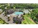 Overhead shot of a community pool with lap lanes, a area, tennis courts, and a clubhouse for recreation at 17637 Snug Harbor Rd, Charlotte, NC 28278