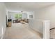 Spacious living area with carpet, large windows, and comfortable seating perfect for relaxation and entertainment at 17637 Snug Harbor Rd, Charlotte, NC 28278