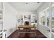 Cozy home office with hardwood floors, built-in bookshelves, and a bright window at 17637 Snug Harbor Rd, Charlotte, NC 28278