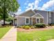 Charming home exterior with well-maintained lawn, stone accents, and tasteful landscaping adding curb appeal at 1836 Fairlawn Ct, Rock Hill, SC 29732
