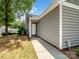 The property's exterior includes a tidy front entrance, a walkway, and manicured landscaping at 1836 Fairlawn Ct, Rock Hill, SC 29732