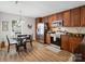 Eat-in kitchen features stainless steel appliances, wood cabinets, and ample countertop space for cooking at 1836 Fairlawn Ct, Rock Hill, SC 29732
